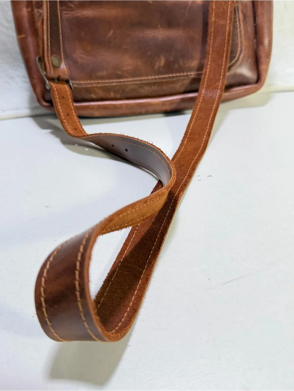 leather satchel crossbody bag with a structured flap front double buckles